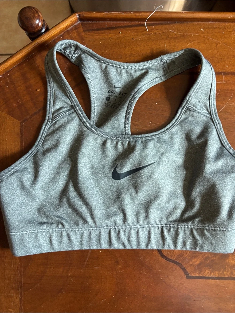 2 Nike and 1 pink Victoria’s Secret Gray Dri-FIT Racerback Sports Bra